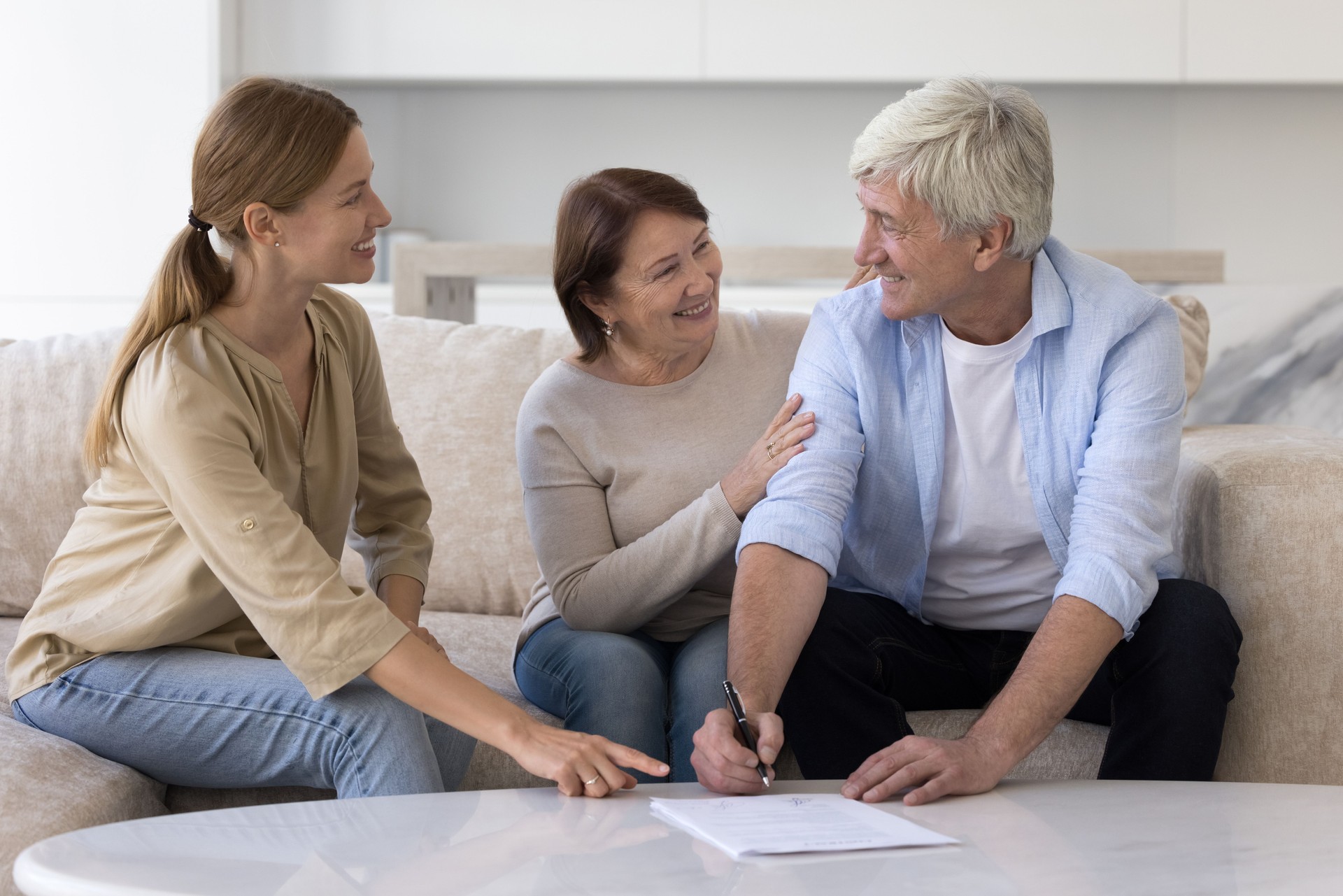 Happy aged clients buying new property signing contract feel satisfied